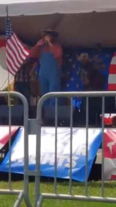 Sasha Baron Cohen Trolls Right-Wing Protest with Sing-Along