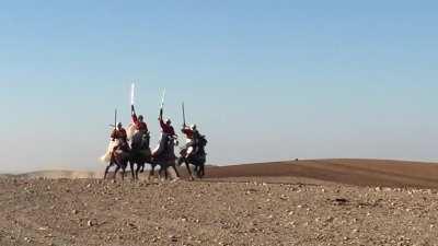 Fantasia riders in motion! (Yes, the lead rider was just fine... check your girth, no matter the discipline!)