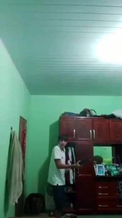 Plays with dad's shotgun hits camera