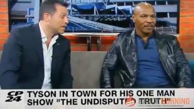 Mike Tyson destroys reporter.