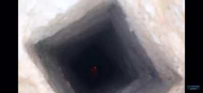 Throwing a molotov down a hole...