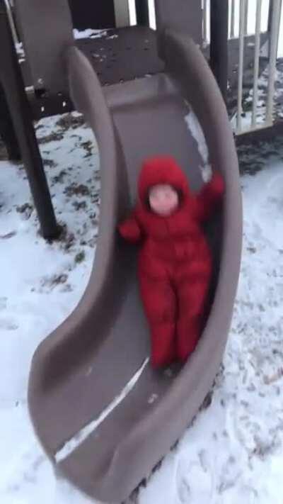 Fist time down the slide by himself