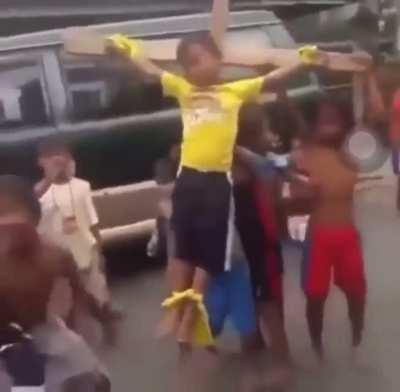 Kid gets crucified