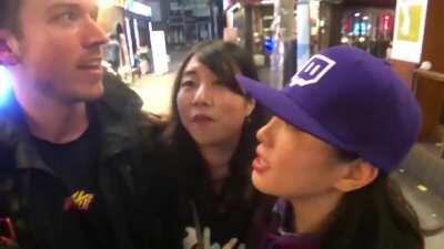 The lady wearing Black was being followed by a weirdo , she noticed a Twitch/Youtube streamer and pretended to be his friend , his reaction is quick