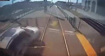 Car tries to cut in front of a train