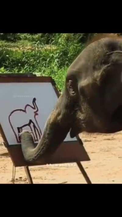 Talented elephant draws an amazing painting of an elephant. They are really smart .