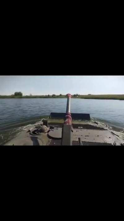 Ua pov A fish jumps into the hatch of a Ukrainian BMP during a river crossing