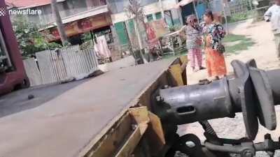 Pickup truck hit by oncoming train after driving over level crossing