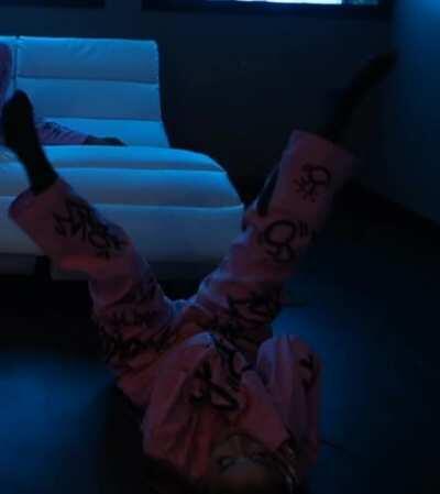 Showing off her feet and flexibility