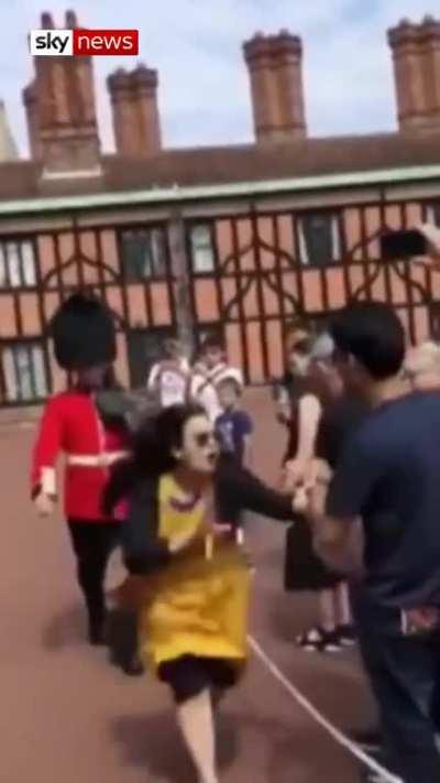Queen's Guard pushes tourist