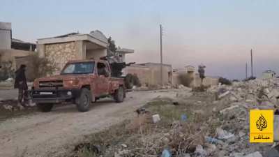 57mm and a 23mm rebel technicals firing during the battle of Aleppo, 2024 (targets not shown)
