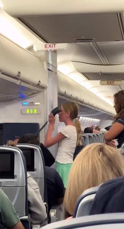 Girl sings Moana on a flight over the intercom