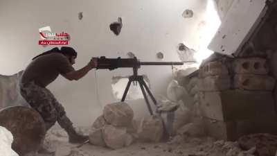 Sultan Murad Brigade fighters utilize an HMG with a homemade recoil controlling counterweight - Handarat Front - 5/28/2015