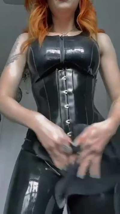 Polishing my latex outfit