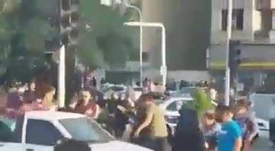 Man hits women not wearing hijab in Iran during the protest, other men show him the error of his ways