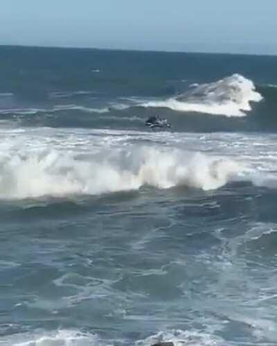 WCGW Trying to jump a wave on a jet ski