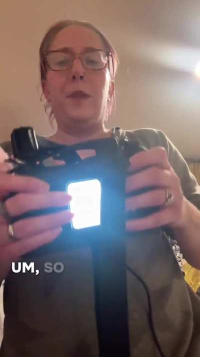 Dani demonstrates how to change the battery pack on her life vest.