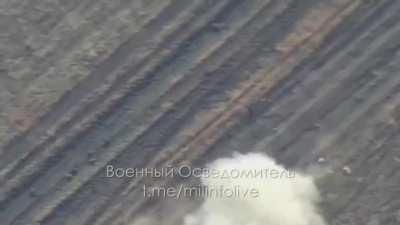 An moving AFU M109 howitzer being hit by Lancet drone. 2023