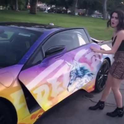 In a skirt and a BMW