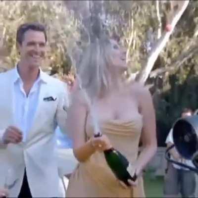 Scarlett Johansson pops champagne