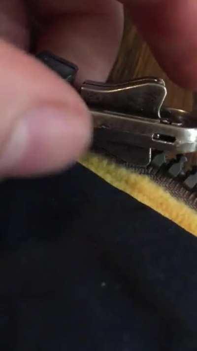 How do I unlock this zipper?