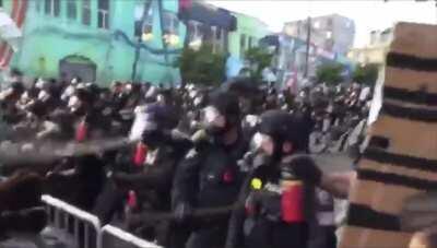 The moment Seattle police instigate a riot over a pink umbrella (seriously). Protest was 100% peaceful before. Share this! Police are already lying about what happened.