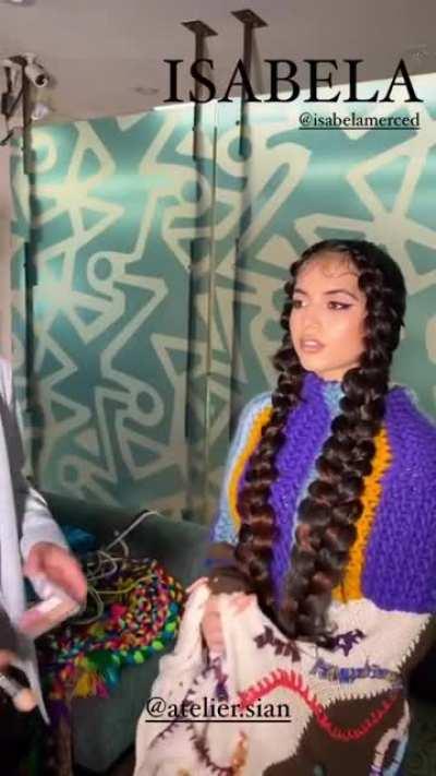 Getting her makeup done