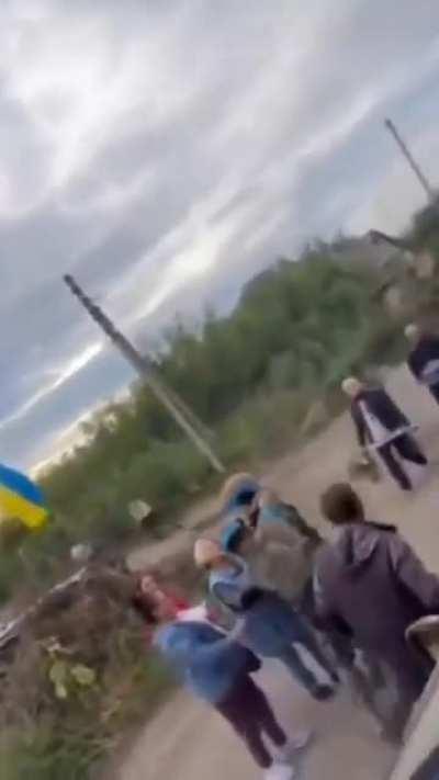 A compilation of locals greeting the Ukrainian army after 6 months of occupation
