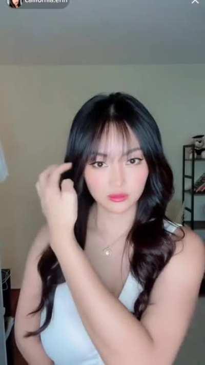 busty Chinese chick walks into room