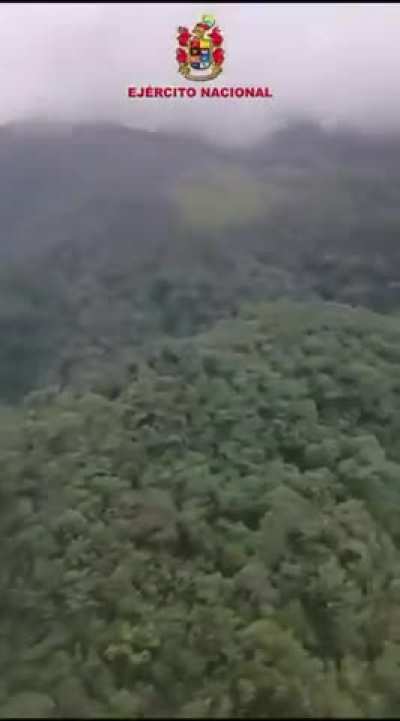 A Colombian army helicopter providing ground support during fighting against the FARC in Buenos Aires, Cauca. (December 16, 2025)