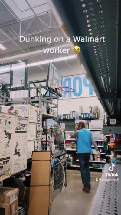 TikToker dunks on and humiliates a Walmart worker.