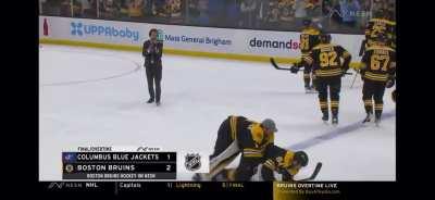 Flubbed hug between Swayman and Lauko.