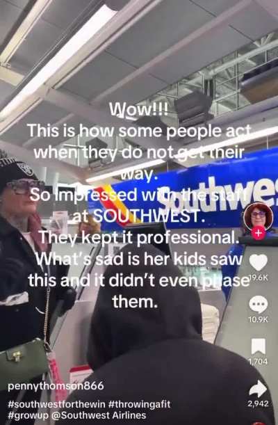 Woman with her kids and dog freaks out at Southwest airlines counter. Drops the N word in front of kids.  