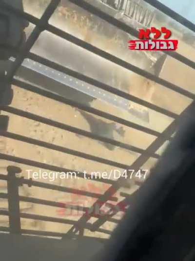 An Israeli armed bulldozer running over a Palestinian civilian in Gaza