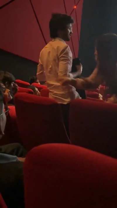 Lafda b/w two girls inside a movie theatre