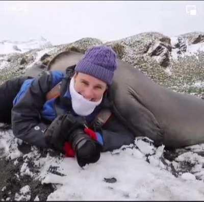 Huddling with a wildlife photographer