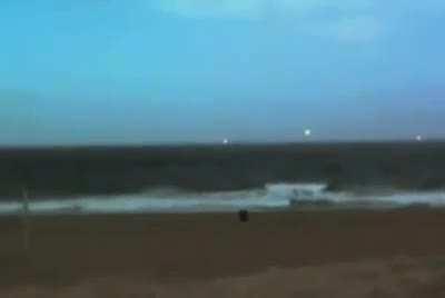 UFOs flying above water showing instantaneous acceleration and transmedium (water to air + air to water) travel (Information in comments)