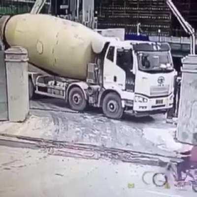 to back up a cement truck at a construction site