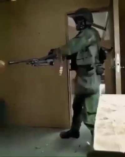 M60/Lewis gun heavies entering buildings