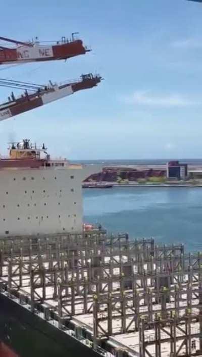 WCGW Too close into another ship, then also hitting the boom of the crane loading it.