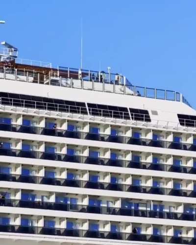 A Blue Origin rocket was moments into liftoff when a massive cruise ship suddenly slid across the frame completely blocking the launch and creating the most unexpected photobomb