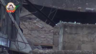 Liwa al-Tawhid sniper takes a shot at an SAA soldier sprinting between cover - 2013