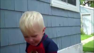Kid has hilarious reaction when a butterfly flies in his face