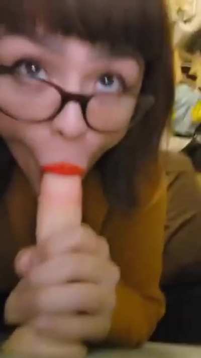 Velma sucking a dildo on a wall