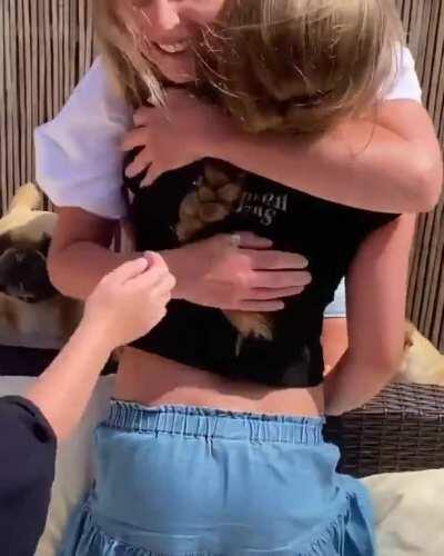 Daughters being reunited with their mom after 9 weeks of being away so she could provide medical care to patients