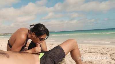 Risky blowjob on the public beach....