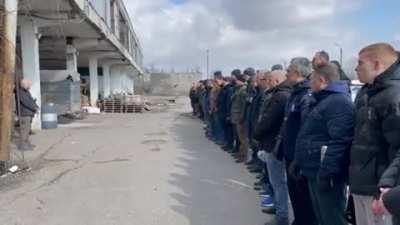 Sailors, engineers, foreign affairs students, driving instructors, IT-specialists - the list of those coming to a private shooting range in Odesa to learn how to deal with arms when they need to defend their land. The lesson starts with the anthem. Like i