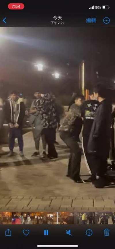 fighting during Urumqi fire vigil tonight