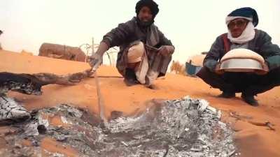 Here is how the Berbers tribe (nomads) in Mauritania, bake bread.