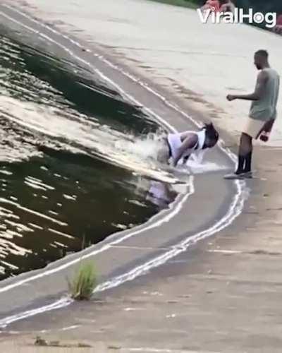 WCGW trying to pull a big fish up the water with a stick